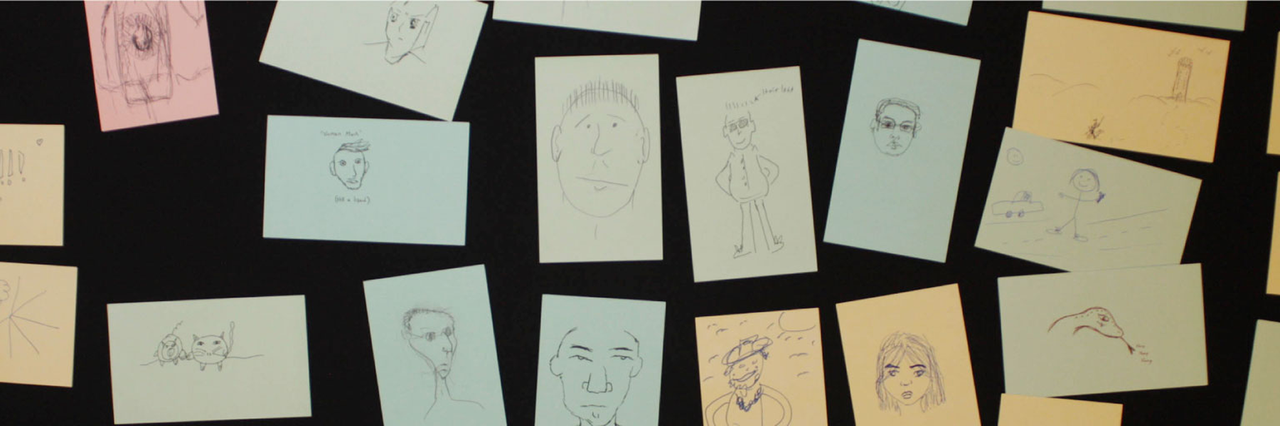 Wall covered in post-it-notes drawings.